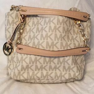 Michael Kors Cream/white Jet Medium size handbag..